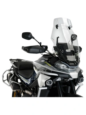 Touring windshield with spoiler