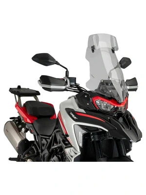 Touring windshield with spoiler