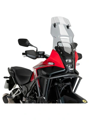 Touring windshield with spoiler