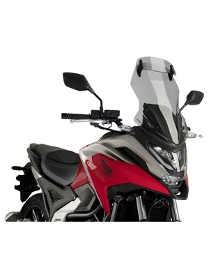 Touring windshield with spoiler