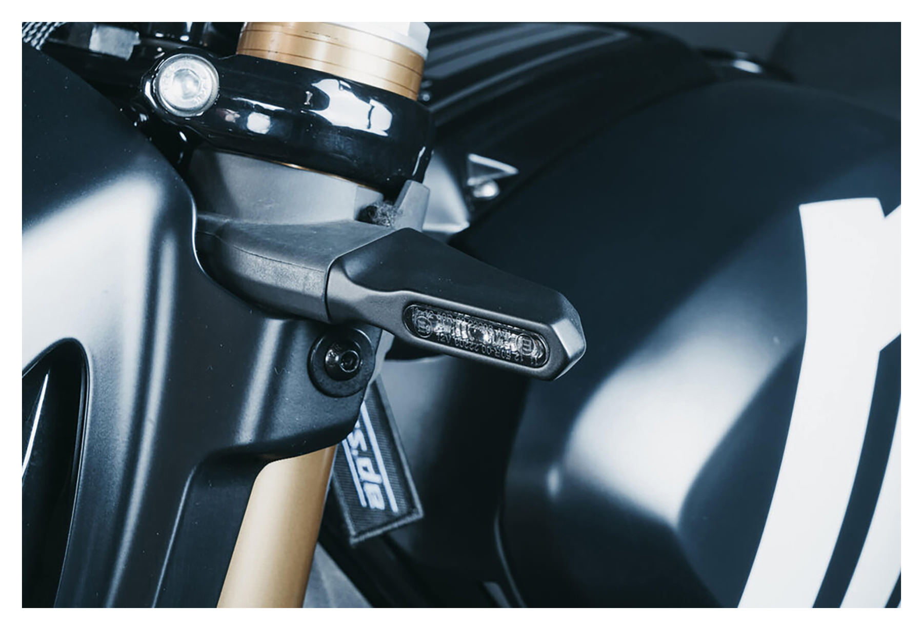 Motoism TURN SIGNAL SPRING INCL. POSITION LIGHT FTR1200