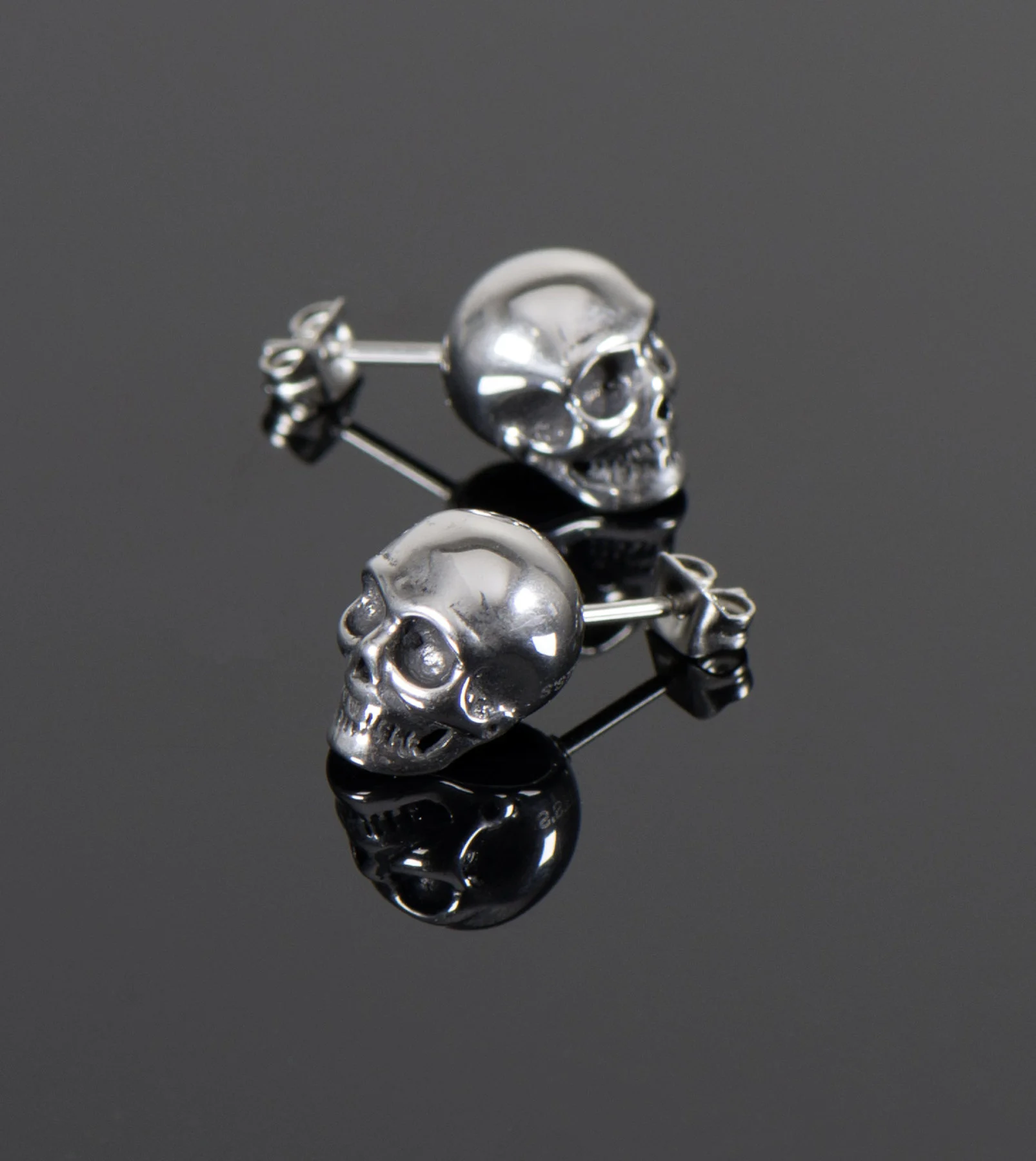 Skull ear studs hot sale