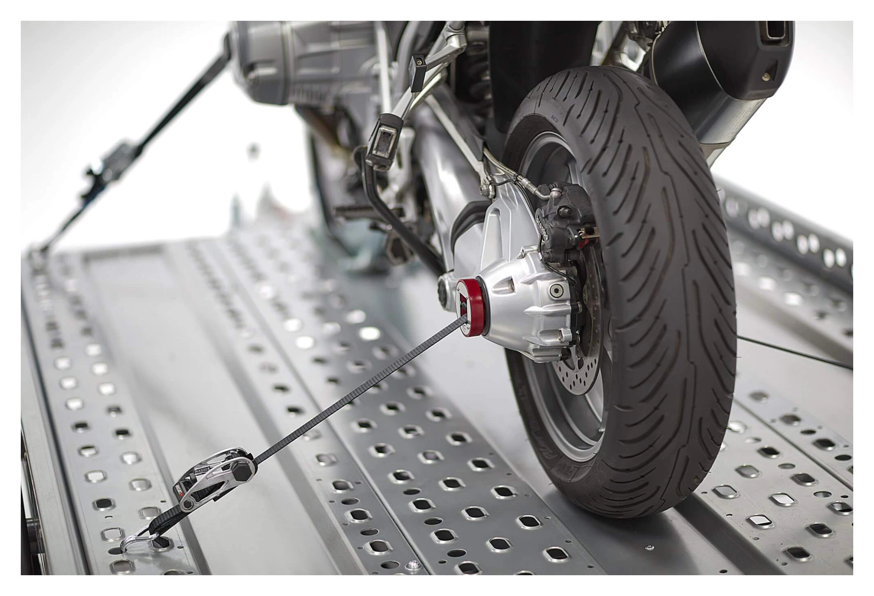 CapStrap tie-down system for BMW
