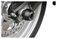 Coussinet protection pour zone des roues